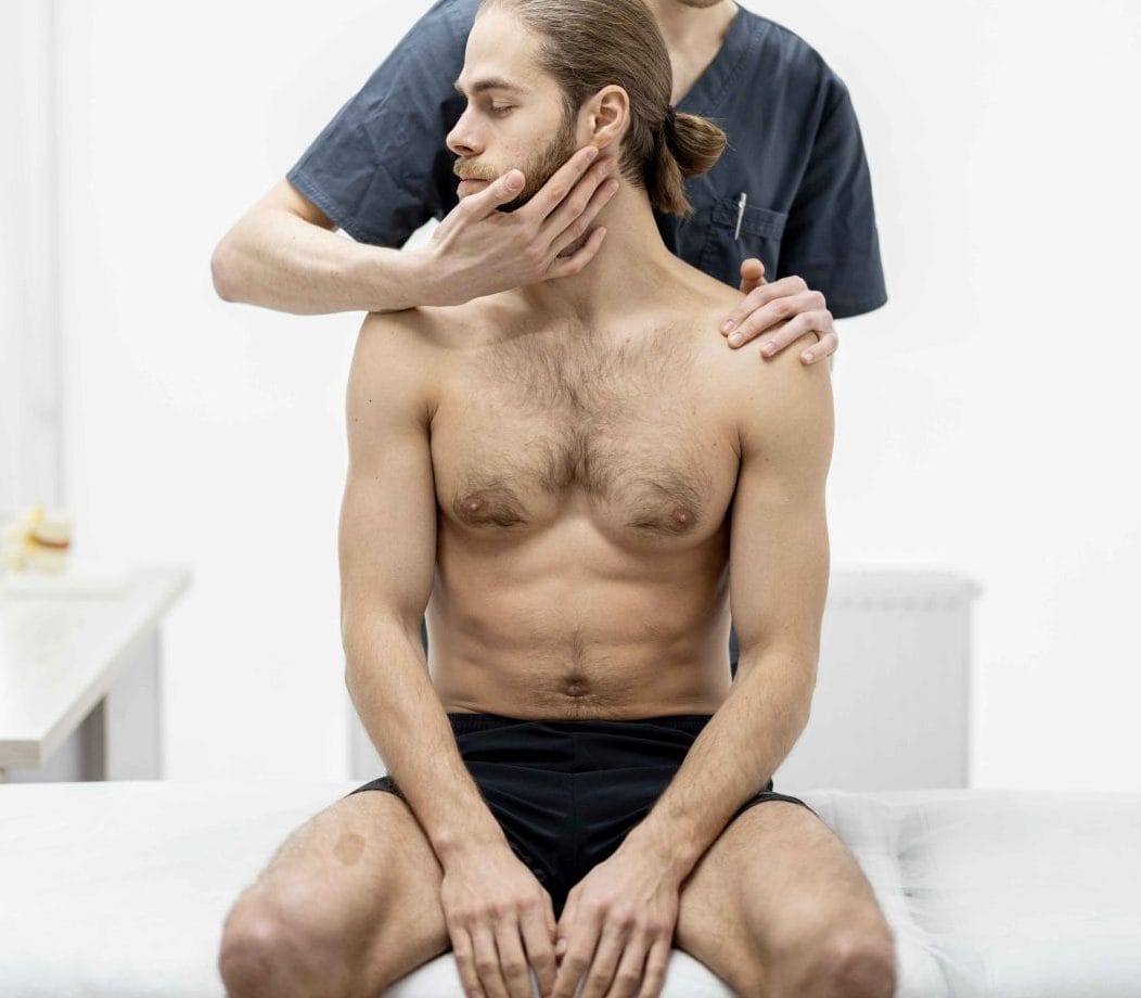 physical-therapist-does-manual-therapy-to-a-young